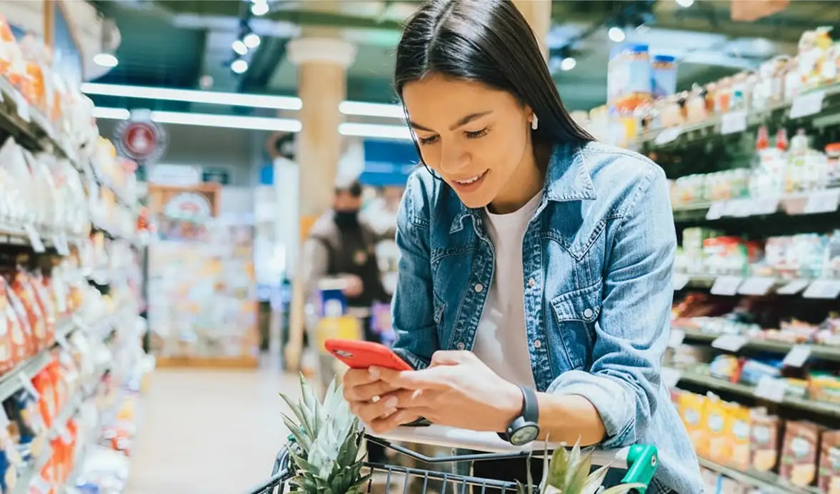Woman earning points while shopping